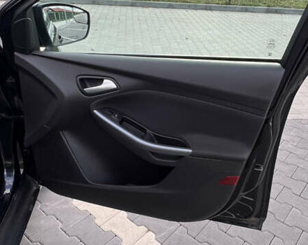 Чорний Форд Фокус, об'ємом двигуна 2 л та пробігом 79 тис. км за 7000 $, фото 17 на Automoto.ua