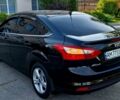 Чорний Форд Фокус, об'ємом двигуна 1 л та пробігом 65 тис. км за 8670 $, фото 5 на Automoto.ua