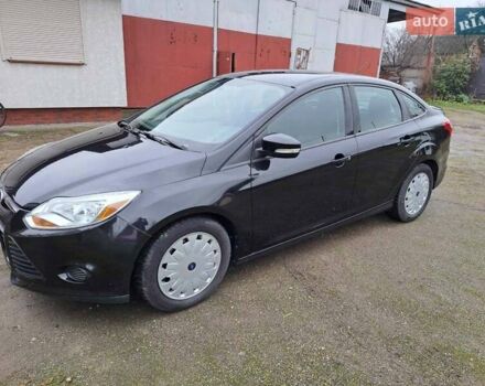 Черный Форд Фокус, объемом двигателя 2 л и пробегом 148 тыс. км за 7400 $, фото 1 на Automoto.ua