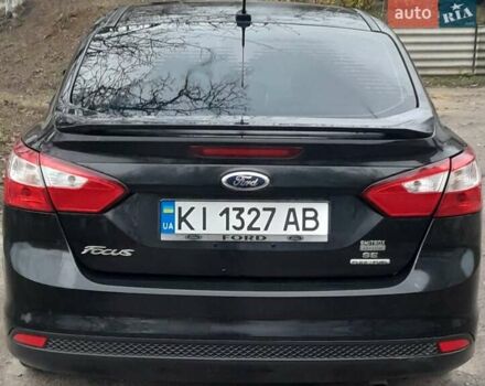 Чорний Форд Фокус, об'ємом двигуна 2 л та пробігом 227 тис. км за 7800 $, фото 12 на Automoto.ua