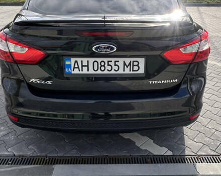 Чорний Форд Фокус, об'ємом двигуна 2 л та пробігом 79 тис. км за 7000 $, фото 19 на Automoto.ua