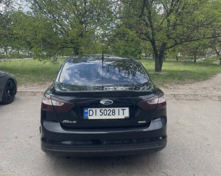 Черный Форд Фокус, объемом двигателя 1 л и пробегом 198 тыс. км за 5800 $, фото 1 на Automoto.ua