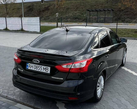 Чорний Форд Фокус, об'ємом двигуна 2 л та пробігом 79 тис. км за 7000 $, фото 4 на Automoto.ua