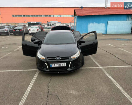 Черный Форд Фокус, объемом двигателя 2 л и пробегом 300 тыс. км за 7500 $, фото 17 на Automoto.ua