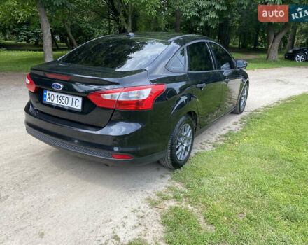 Чорний Форд Фокус, об'ємом двигуна 2 л та пробігом 217 тис. км за 7500 $, фото 2 на Automoto.ua