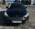 Чорний Форд Фокус, об'ємом двигуна 2 л та пробігом 99 тис. км за 7800 $, фото 1 на Automoto.ua