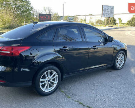 Чорний Форд Фокус, об'ємом двигуна 2 л та пробігом 220 тис. км за 6999 $, фото 2 на Automoto.ua