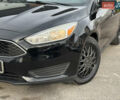 Чорний Форд Фокус, об'ємом двигуна 2 л та пробігом 121 тис. км за 9200 $, фото 4 на Automoto.ua