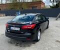 Чорний Форд Фокус, об'ємом двигуна 2 л та пробігом 157 тис. км за 7750 $, фото 4 на Automoto.ua