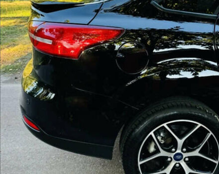 Черный Форд Фокус, объемом двигателя 2 л и пробегом 97 тыс. км за 8300 $, фото 2 на Automoto.ua