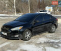 Чорний Форд Фокус, об'ємом двигуна 2 л та пробігом 145 тис. км за 8899 $, фото 1 на Automoto.ua