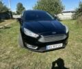 Чорний Форд Фокус, об'ємом двигуна 2 л та пробігом 96 тис. км за 7496 $, фото 1 на Automoto.ua