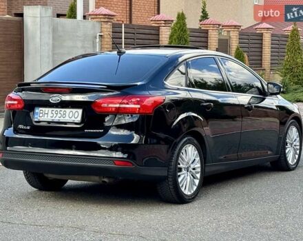 Чорний Форд Фокус, об'ємом двигуна 2 л та пробігом 145 тис. км за 9900 $, фото 4 на Automoto.ua