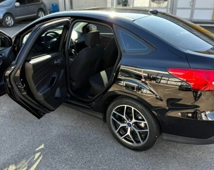 Чорний Форд Фокус, об'ємом двигуна 2 л та пробігом 165 тис. км за 9300 $, фото 2 на Automoto.ua