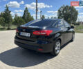 Чорний Форд Фокус, об'ємом двигуна 2 л та пробігом 214 тис. км за 8200 $, фото 4 на Automoto.ua