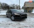 Черный Форд Фокус, объемом двигателя 2 л и пробегом 174 тыс. км за 7950 $, фото 1 на Automoto.ua