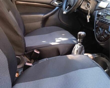 Черный Форд Фокус, объемом двигателя 1.8 л и пробегом 420 тыс. км за 3100 $, фото 3 на Automoto.ua