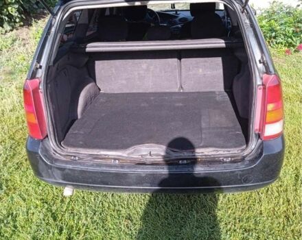 Черный Форд Фокус, объемом двигателя 1.8 л и пробегом 420 тыс. км за 3100 $, фото 2 на Automoto.ua