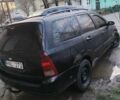Черный Форд Фокус, объемом двигателя 1.8 л и пробегом 420 тыс. км за 1400 $, фото 9 на Automoto.ua