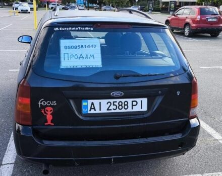 Черный Форд Фокус, объемом двигателя 1.6 л и пробегом 390 тыс. км за 2700 $, фото 1 на Automoto.ua