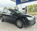 Черный Форд Фокус, объемом двигателя 1.6 л и пробегом 260 тыс. км за 3950 $, фото 1 на Automoto.ua