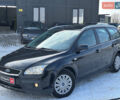 Черный Форд Фокус, объемом двигателя 1.6 л и пробегом 253 тыс. км за 4490 $, фото 1 на Automoto.ua