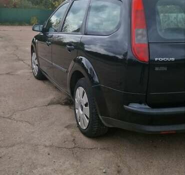 Черный Форд Фокус, объемом двигателя 1.6 л и пробегом 286 тыс. км за 4550 $, фото 4 на Automoto.ua
