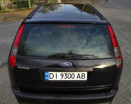 Черный Форд Фокус, объемом двигателя 1.6 л и пробегом 208 тыс. км за 4600 $, фото 7 на Automoto.ua