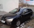 Черный Форд Фокус, объемом двигателя 1.6 л и пробегом 350 тыс. км за 4721 $, фото 1 на Automoto.ua