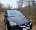 Черный Форд Фокус, объемом двигателя 1.6 л и пробегом 289 тыс. км за 4500 $, фото 1 на Automoto.ua