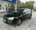 Черный Форд Фокус, объемом двигателя 1.6 л и пробегом 260 тыс. км за 3950 $, фото 1 на Automoto.ua