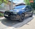Черный Форд Фокус, объемом двигателя 1.6 л и пробегом 255 тыс. км за 3900 $, фото 1 на Automoto.ua