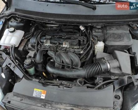 Черный Форд Фокус, объемом двигателя 1.6 л и пробегом 312 тыс. км за 4800 $, фото 24 на Automoto.ua