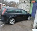 Чорний Форд Фокус, об'ємом двигуна 2 л та пробігом 164 тис. км за 5900 $, фото 5 на Automoto.ua