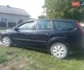 Чорний Форд Фокус, об'ємом двигуна 2 л та пробігом 437 тис. км за 3200 $, фото 26 на Automoto.ua