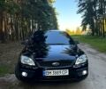 Черный Форд Фокус, объемом двигателя 1.8 л и пробегом 225 тыс. км за 4700 $, фото 1 на Automoto.ua