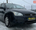 Черный Форд Фокус, объемом двигателя 1.6 л и пробегом 206 тыс. км за 4400 $, фото 1 на Automoto.ua