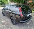 Черный Форд Фокус, объемом двигателя 1.6 л и пробегом 255 тыс. км за 3900 $, фото 7 на Automoto.ua
