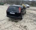 Черный Форд Фокус, объемом двигателя 1.6 л и пробегом 260 тыс. км за 4200 $, фото 3 на Automoto.ua