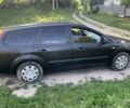 Черный Форд Фокус, объемом двигателя 1.6 л и пробегом 325 тыс. км за 3800 $, фото 1 на Automoto.ua