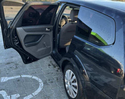 Черный Форд Фокус, объемом двигателя 1.56 л и пробегом 305 тыс. км за 4200 $, фото 6 на Automoto.ua