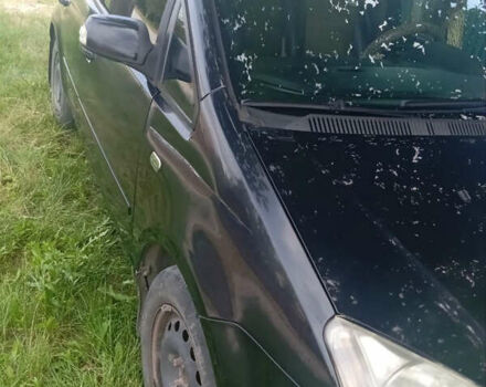 Черный Форд Фокус, объемом двигателя 1.8 л и пробегом 234 тыс. км за 4900 $, фото 1 на Automoto.ua