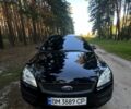 Черный Форд Фокус, объемом двигателя 1.8 л и пробегом 225 тыс. км за 4700 $, фото 2 на Automoto.ua