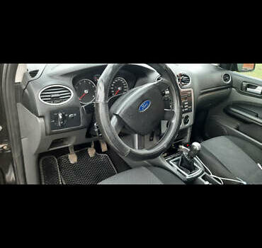 Черный Форд Фокус, объемом двигателя 1.6 л и пробегом 298 тыс. км за 3800 $, фото 6 на Automoto.ua