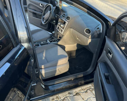 Черный Форд Фокус, объемом двигателя 1.56 л и пробегом 305 тыс. км за 4200 $, фото 9 на Automoto.ua