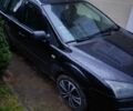 Чорний Форд Фокус, об'ємом двигуна 2 л та пробігом 330 тис. км за 4450 $, фото 1 на Automoto.ua