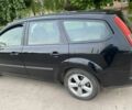 Черный Форд Фокус, объемом двигателя 1.6 л и пробегом 200 тыс. км за 4899 $, фото 1 на Automoto.ua