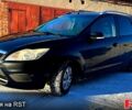 Черный Форд Фокус, объемом двигателя 1.6 л и пробегом 210 тыс. км за 5700 $, фото 1 на Automoto.ua