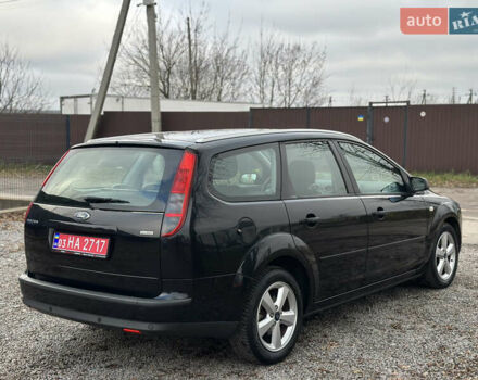 Черный Форд Фокус, объемом двигателя 1.8 л и пробегом 188 тыс. км за 5600 $, фото 12 на Automoto.ua