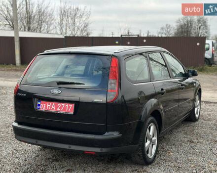 Черный Форд Фокус, объемом двигателя 1.8 л и пробегом 188 тыс. км за 5600 $, фото 10 на Automoto.ua